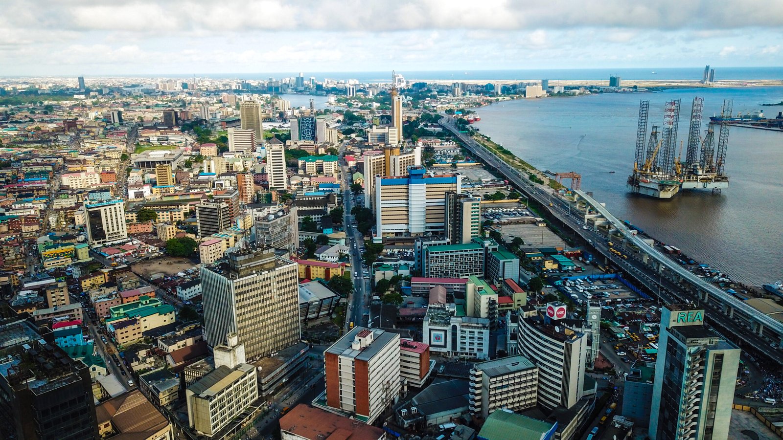 A wide view of Lagos Island beside the lagoon.