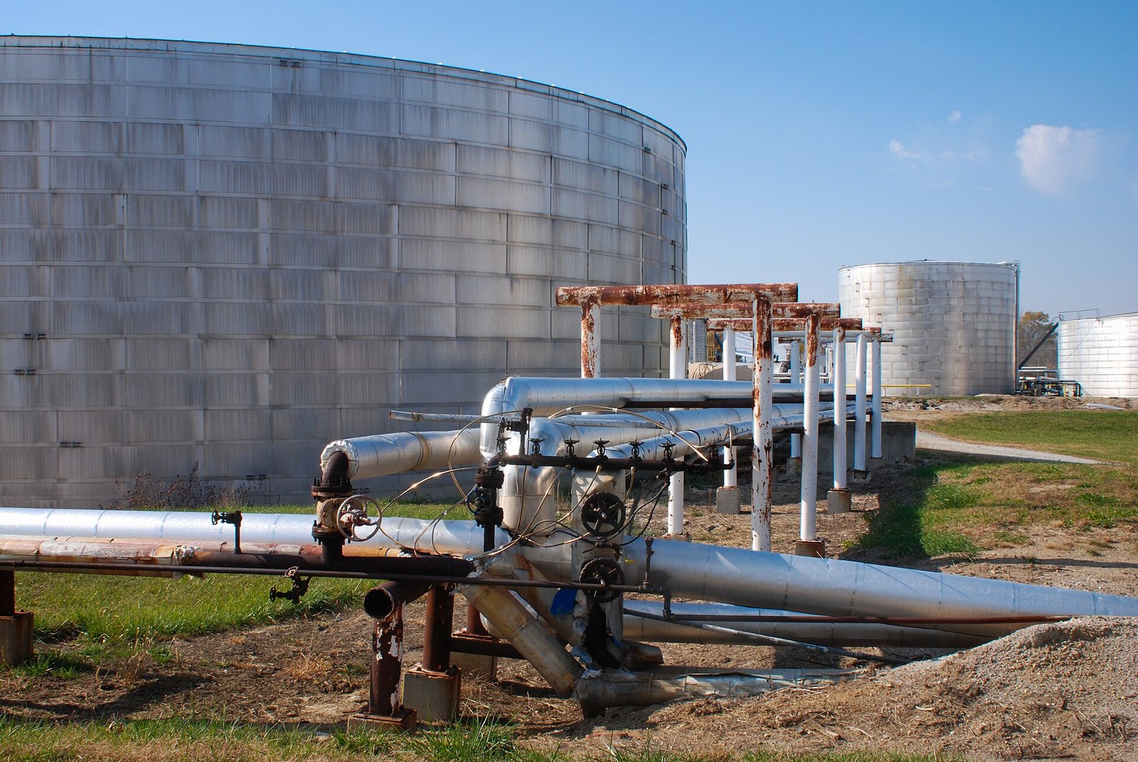Storage tanks and pipes at a refinery