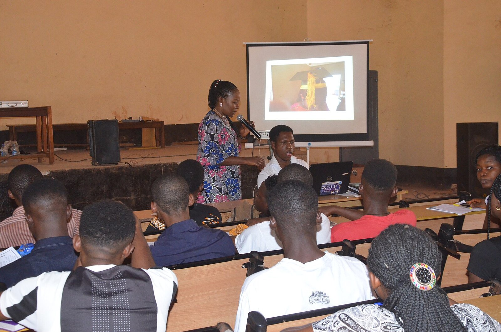 Teacher and students on Nsukka campus